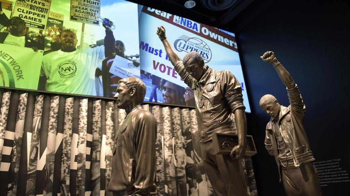 A statue of the 1968 Olympics Black Power salute is on display at the National Museum of African American History and Culture in Washington, D.C.