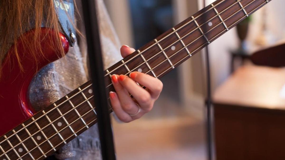 Thirteen-year-old Sophie plays bass, while 17-year-old Elody plays lead guitar. The Bensch sisters of Pawleys Island hold practice for their band, 3 Nails, Thursday, November 17, 2016 at their family's home.