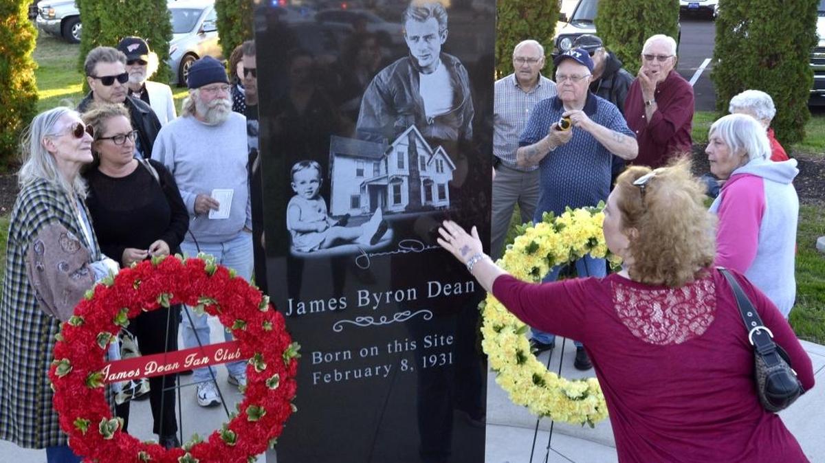 
A James Dean fan reaches out to touch the James Dean Birthplace Monument after its dedication in Marion, Ind., on Wednesday, Sept. 30, 2015. Wednesday was the 60th anniversary of the legendary actor's death. 
