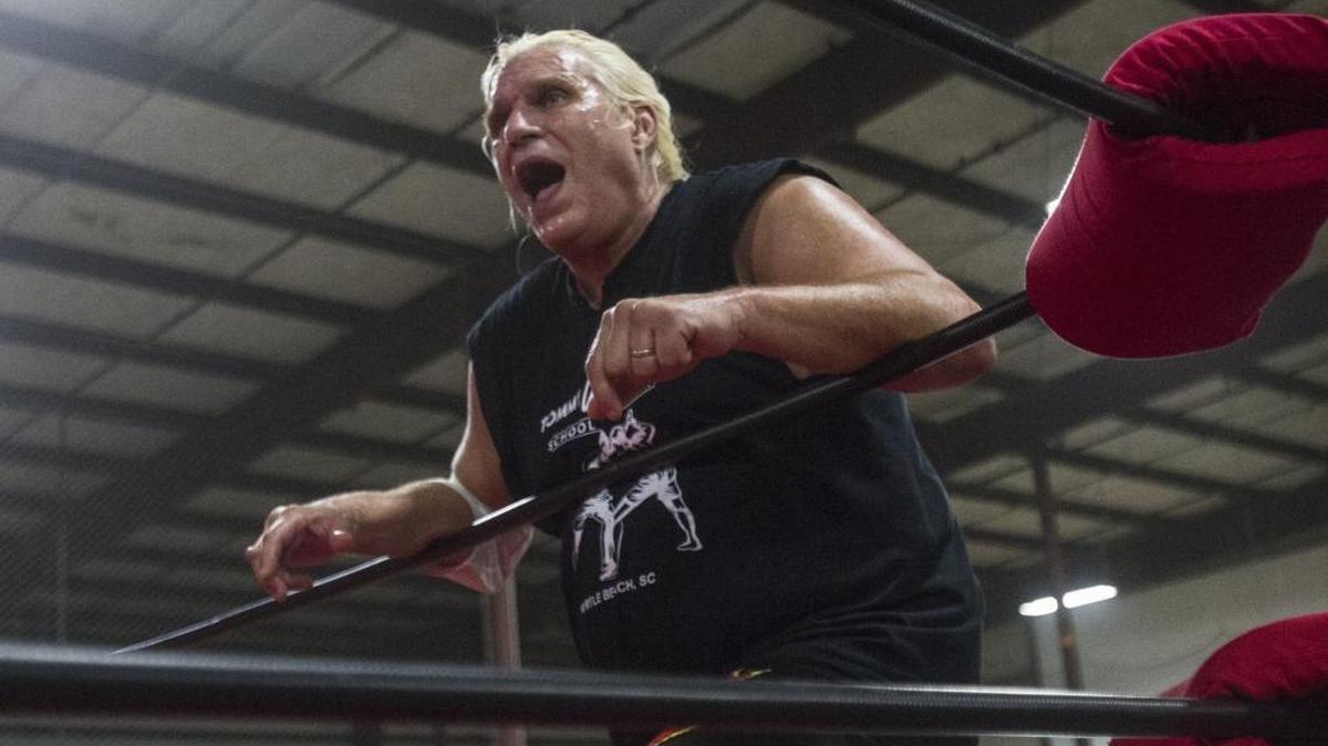 Tommy "Wildfire" Rich cheers on partner Ricky Morton during the Halloween Fight Nite event at the X Gym Sports Mall on Oct. 28.