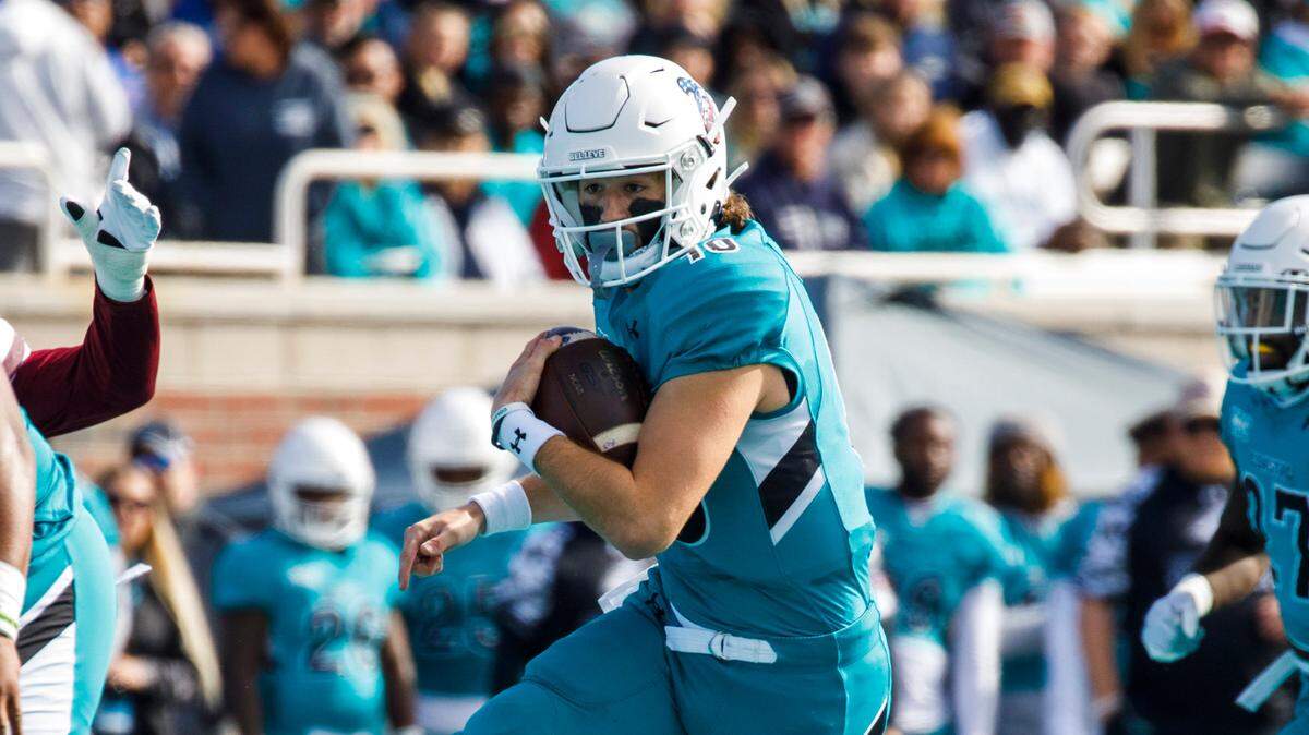 Coastal’s Grayson McCall — who’s pictured running the ball against the Texas State Bobcats in a Sun Belt Conference NCAA FBS college football game in Conway SC. Nov. 20, 2021 — recently signed a deal with Darlington Raceway.