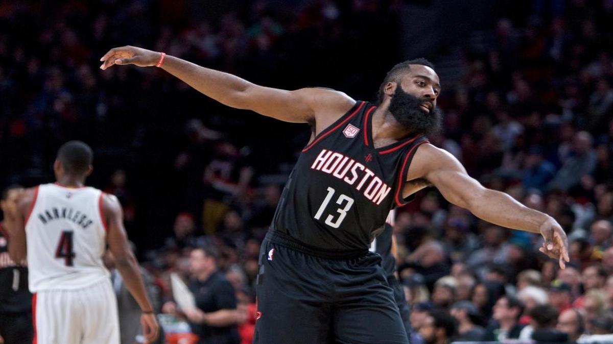 Houston Rockets guard James Harden reacts after making a basket against the Portland Trail Blazers on Sunday.