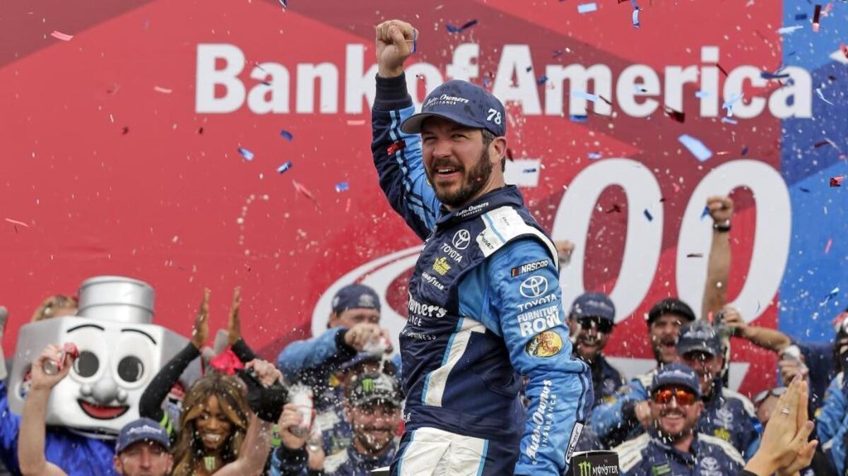 Martin Truex Jr celebrates in Victory Lane after winning an Oct. 8 race at Charlotte Motor Speedway.