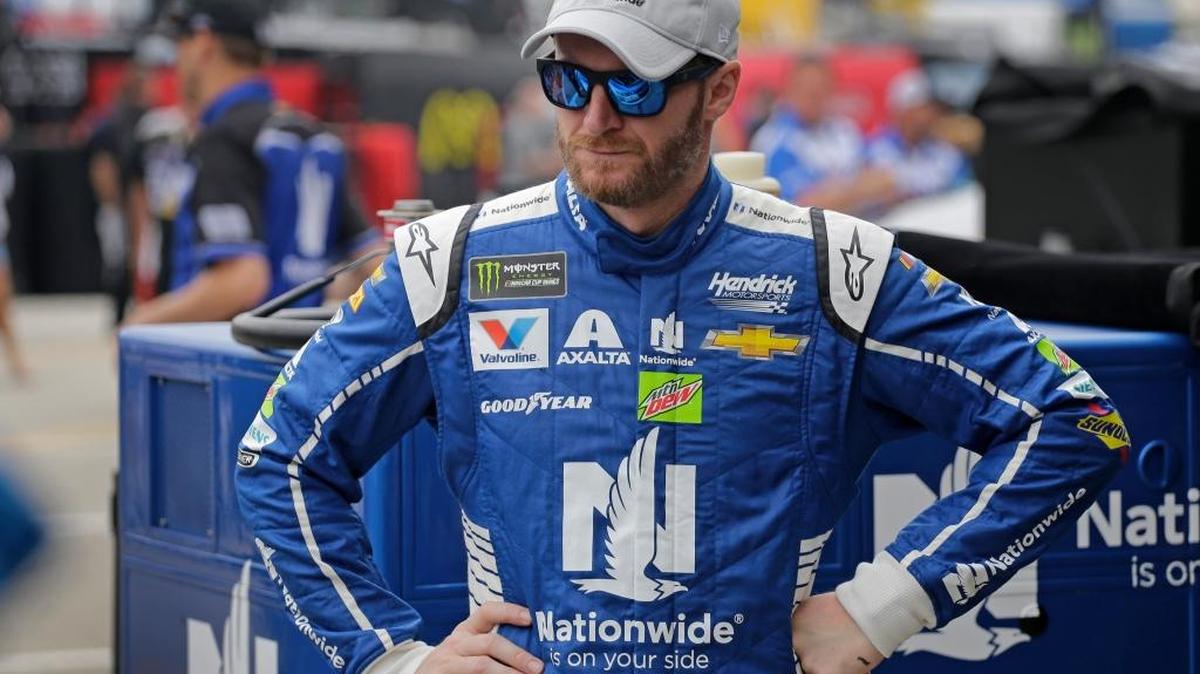 Dale Earnhardt Jr. watches crew members work on his car during practice for Sunday’s Daytona 500.