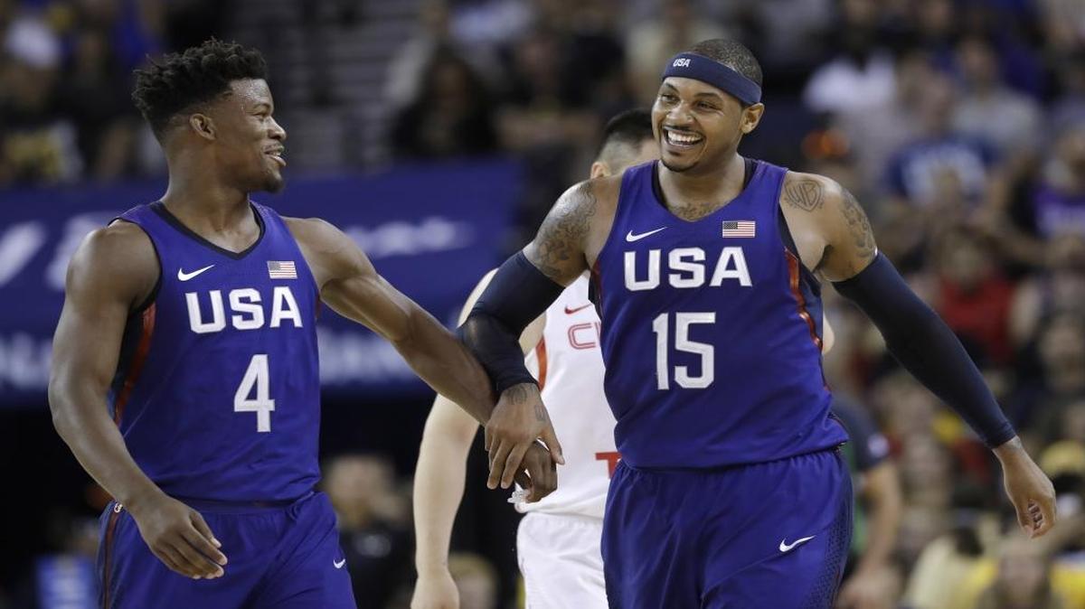 Team USA’s Carmelo Anthony (right) celebrates with teammate Jimmy Butler during the second half of an exhibition game against China last week.