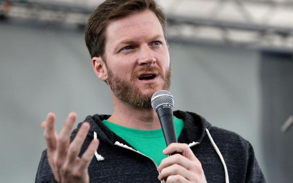 Dale Earnhardt Jr. speaks with fans at the Charlotte Motor Speedway on Friday.