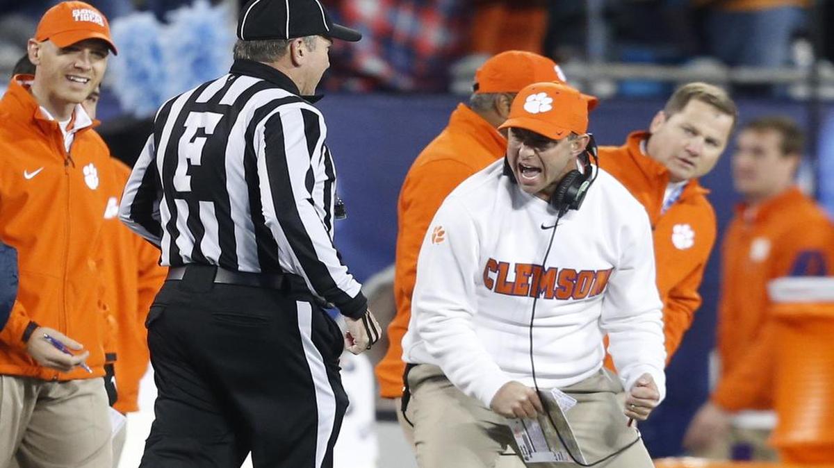 Clemson head coach Dabo Swinney is not happy with the lack of a call by the officials during the first half of UNC's game against Clemson in the ACC Football Championship at Bank of America Stadium in Charlotte Saturday.