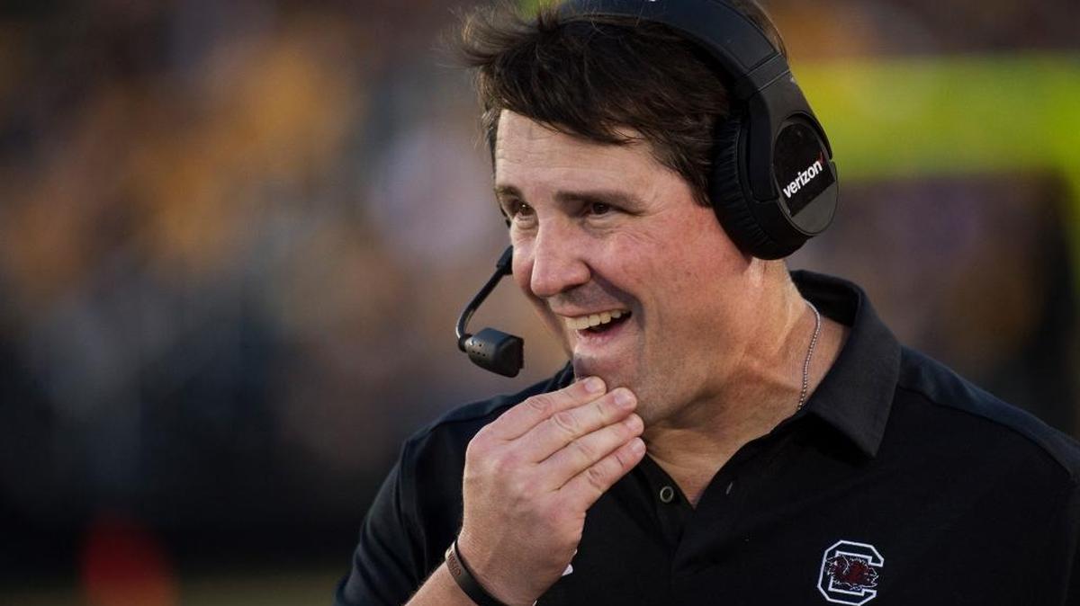 South Carolina head coach Will Muschamp rubs his chin as he watches his team play against Missouri on Saturday.