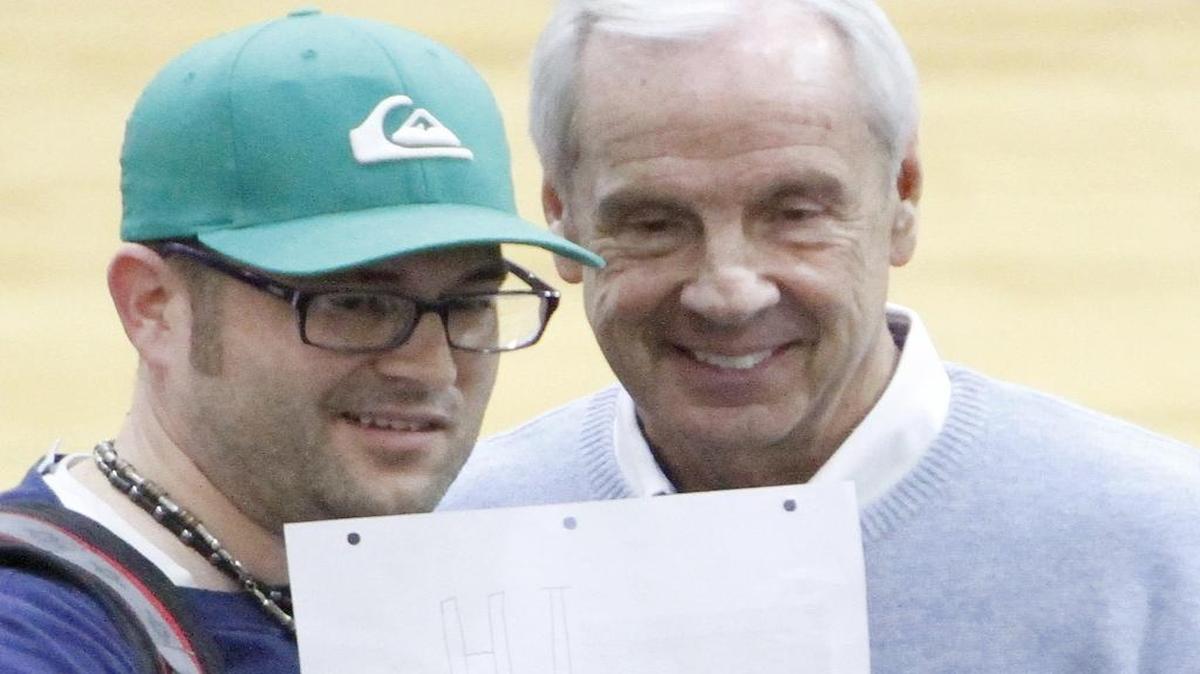 North Carolina coach Roy Williams (right) drew a crowd at the Beach Ball Classic on Tuesday.