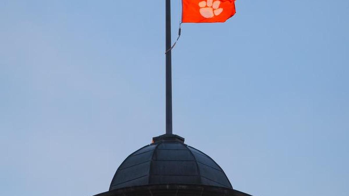 Once Clemson's football team clinched its first national championship in 35 years late Monday, an orange Tiger paw was raised over the dome of the SC State House.