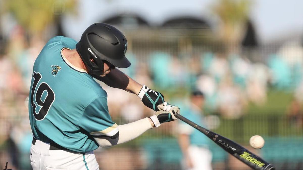 Coastal Carolina senior Kevin Woodall Jr. of Georgetown hits a two-run home run in the first inning of Coastal's 2018 season opener. Woodall was named the Sun Belt Conference Player of the Week for his performance last weekend against Louisiana-Monroe.