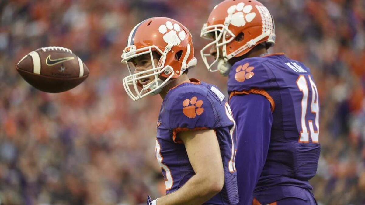 Clemson wide receiver and Socastee high school alumnus Hunter Renfrow (13) throws the ball to the referee after making a catch during the first half against Wake Forest on Saturday.
