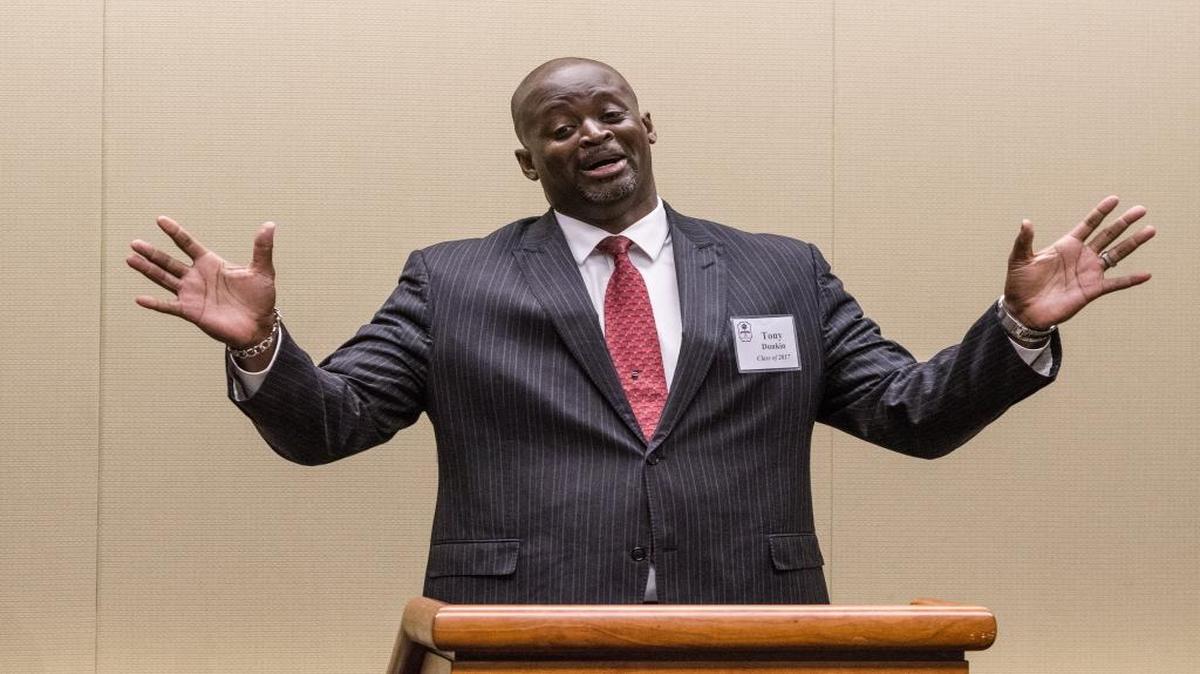 South Carolina Athletic Hall of Fame inductee Tony Dunkin, a former standout at Coastal Carolina, speaks to his fellow classmates during the induction ceremony.