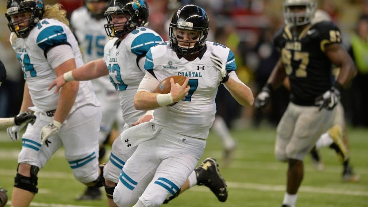 Coastal Carolina quarterback Kilton Anderson runs for yardage against Idaho on Saturday.