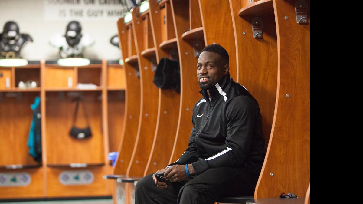 
Coastal Carolina Line Backer Quinn Backus sits in the CCU locker room.
