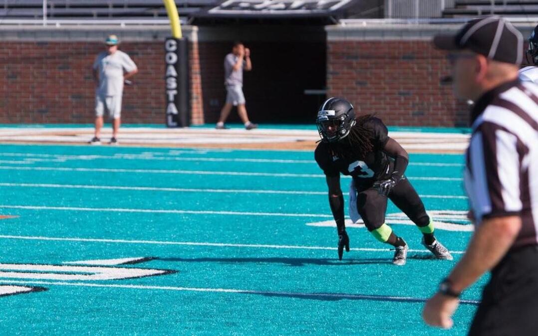 
Coastal Carolina safety Kelvin Deveaux watches the offense during the Chants’ first scrimmage.
