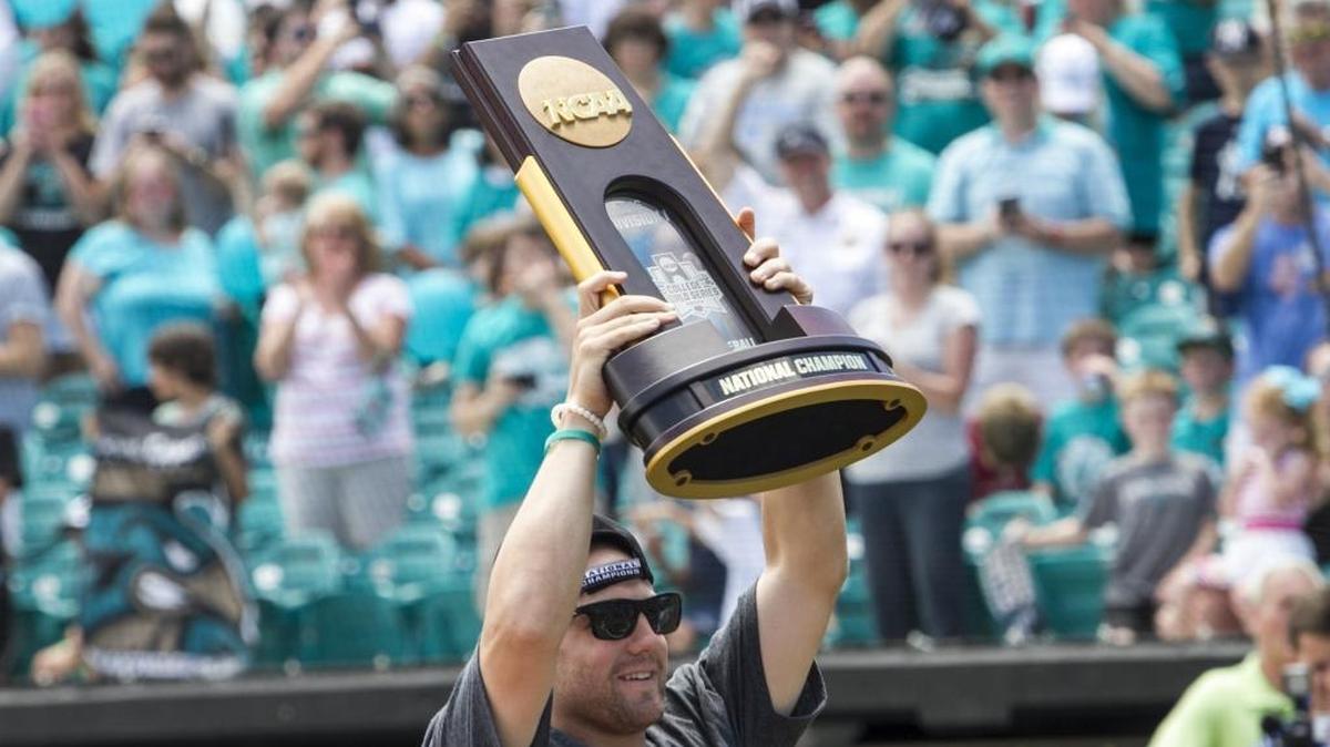 Connor Owings holds the National Championship Trophy up to the crowd in Spring Brooks Stadium last June during a celebration of Coastal Carolina’s national championship.