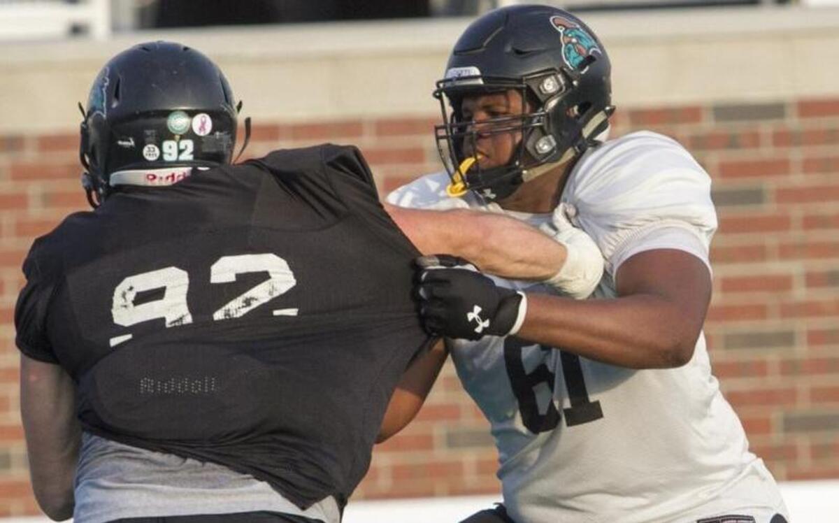 Former Coastal Carolina tackle Voghens Larrieux (in white) has been invited to attend the Buffalo Bills rookie mini camp.