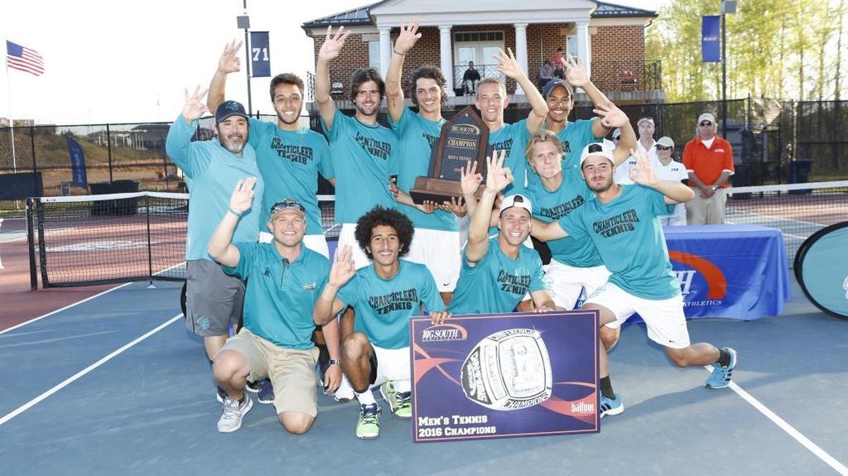 The Coastal Carolina men’s tennis team poses for a picture after winning the Big South championship Saturday.