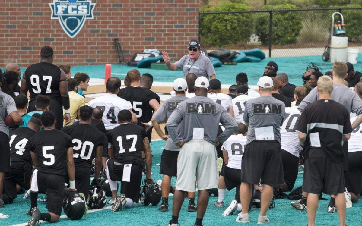 Coach Joe Moglia and the Coastal Carolina football team suffered their first loss Saturday night.