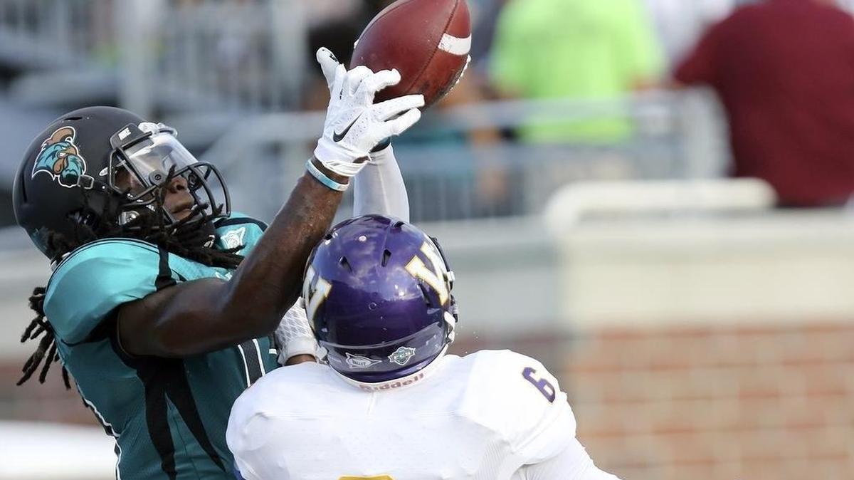 
Coastal Carolina's John Israel goes up for a catch against Western Illinois.

