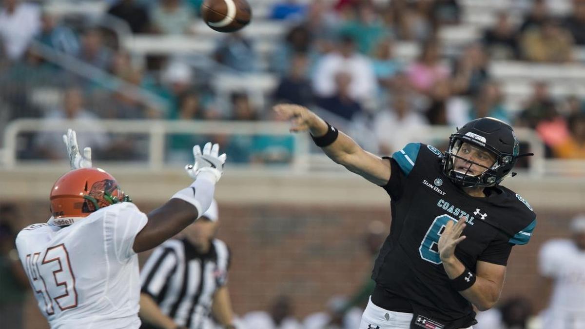 Coastal Carolina quarterback Josh Stilley (right) left Saturday’s game against Jacksonville State with a knee injury.