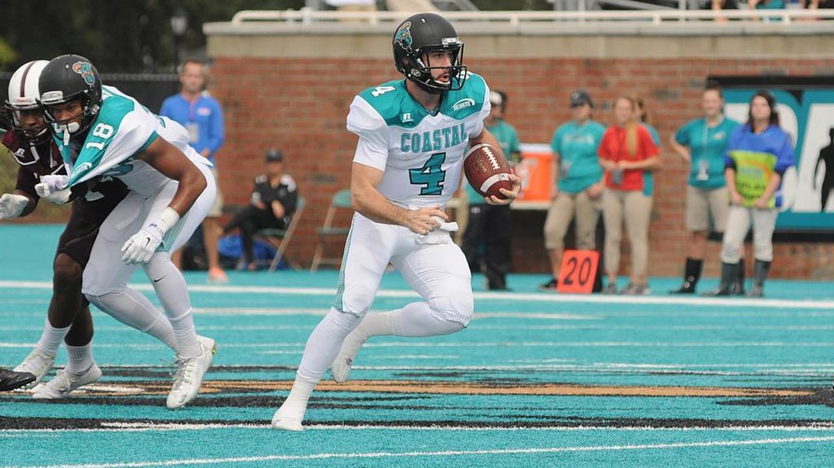 
 Coastal Carolina quarterback Alex Ross takes off on a keeper against Alabama A&M.
