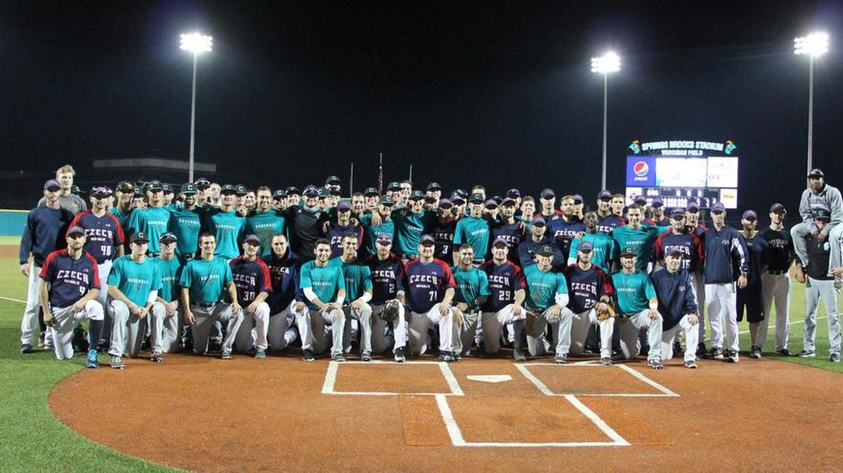 
Coastal Carolina and the Czech Republic team pose for a group photo after the game. 

