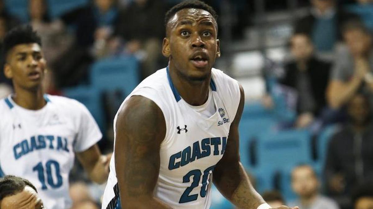 Coastal Carolina forward Demario Beck (20) tries to score against Texas State in the Chanticleers’ first meeting with the Bobcats this season, falling 53-48 at the HTC Center in Conway.