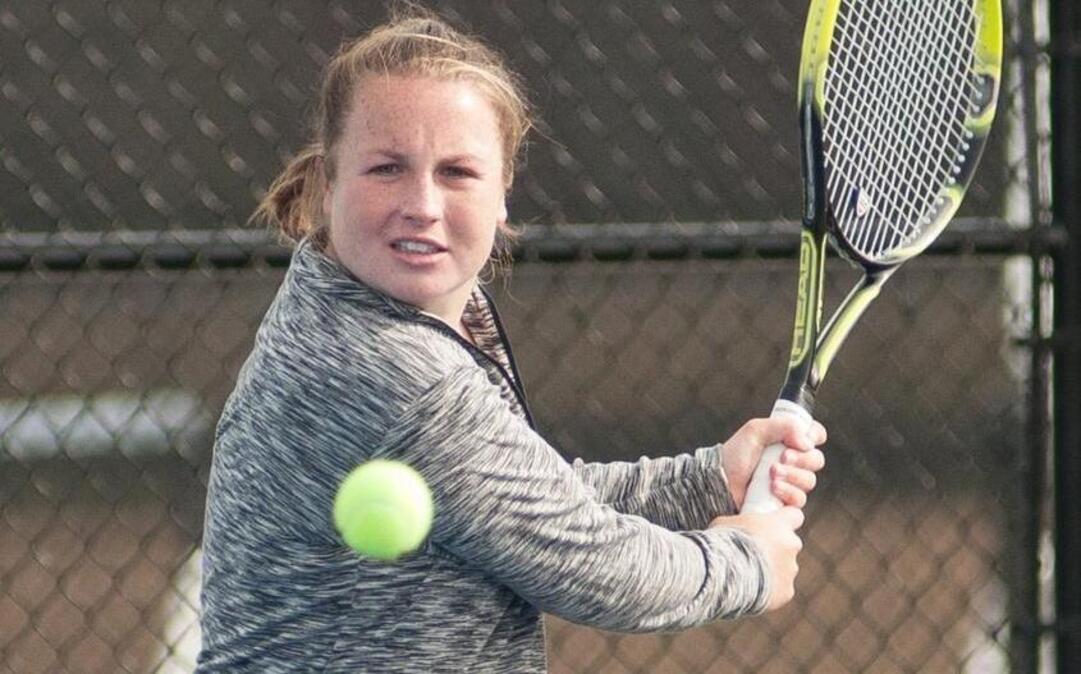 Libby Scott returns the ball during a match against Savannah State earlier this season
