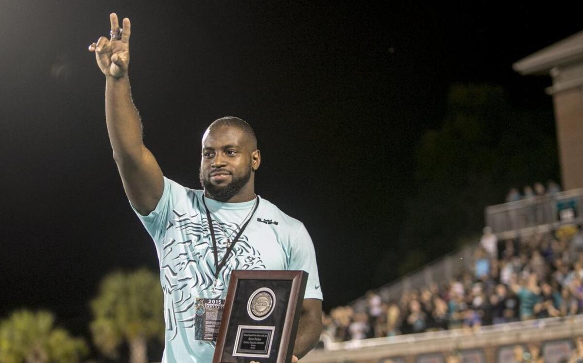 
Former Coastal Carolina linebacker Quinn Backus receives the Big South Male Athlete of the Year award during the Chants’ game against Bryant on Saturday.
