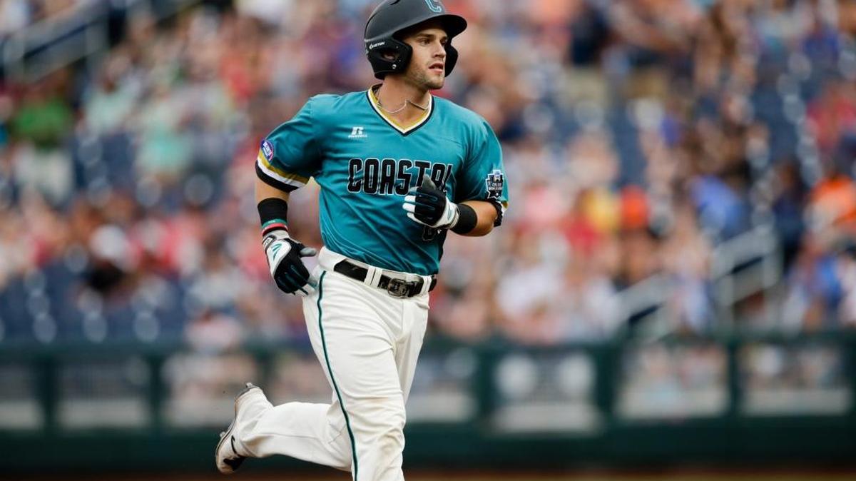 Coastal Carolina’s Tyler Chadwick rounds the bases after hitting a solo home run during the second inning.