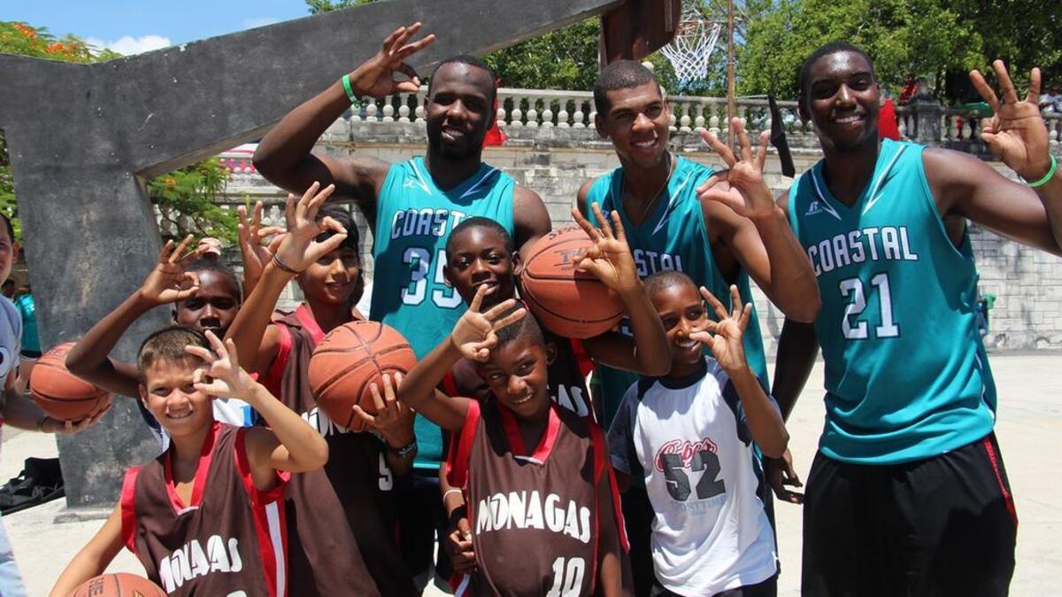 
Coastal Carolina players pose for a picture with Cuban children during the team’s trip to Cuba earlier this month.
