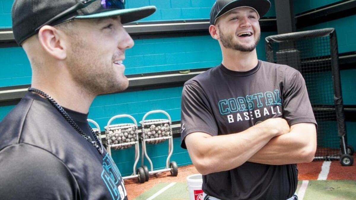Coastal Carolina seniors Connor Owings (left) and Mike Morrison have have been best friends since they were 5 years old. The pair played both football and baseball together at Gilbert High School, walked on to the CCU baseball team and are now team MVPs.