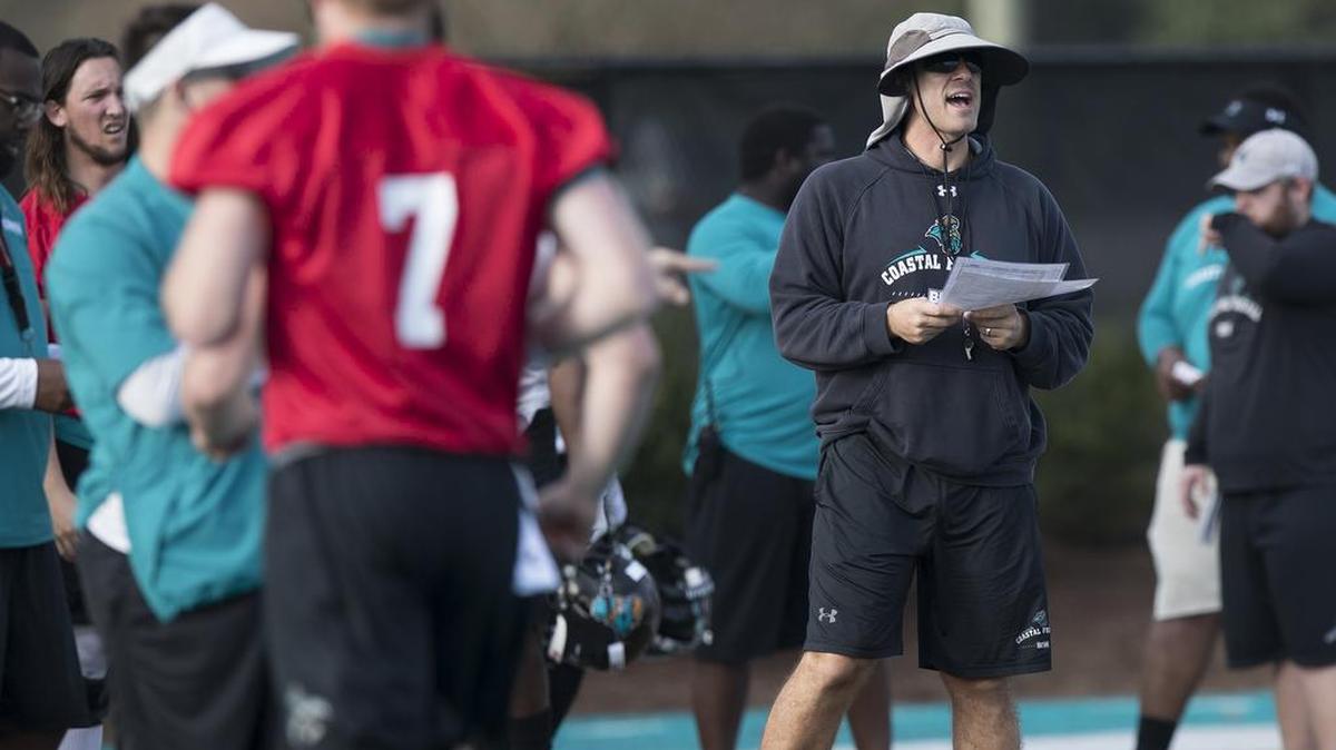 Coastal Carolina offensive coordinator and associate head coach Jamey Chadwell gives instructions to players as the Chants go through drills during the first day of spring football practice on Feb. 24 at the Brooks Stadium in Conway.