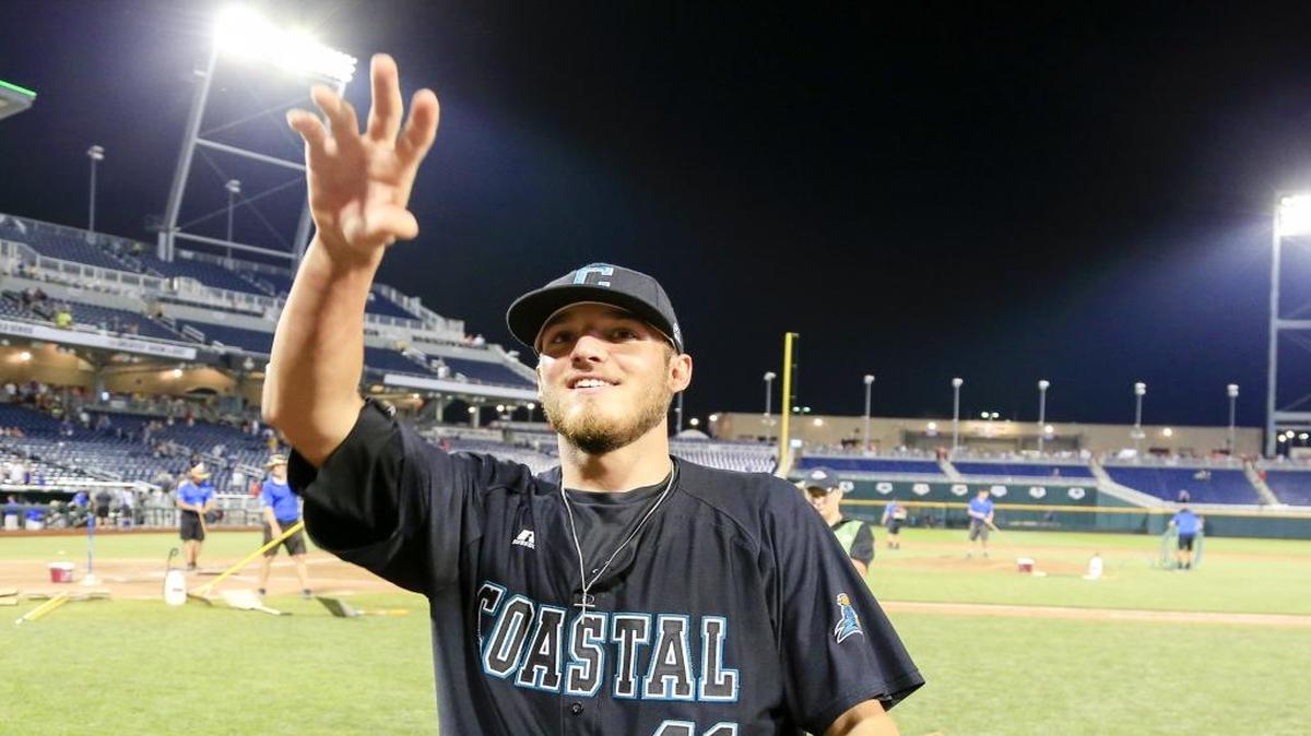 Coastal Carolina pitcher Andrew Beckwith acknowledges fans following a victory at last month’s College World Series. Beckwith was named Thursday the Big South’s Male Athlete of the Year.
