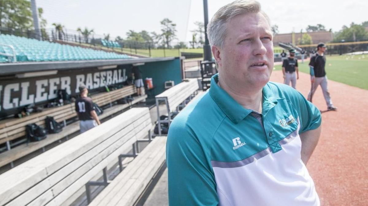 Coastal Carolina athletic director Matt Hogue watches the baseball team at one of the final home practices before leaving for the College World Series in Omaha, Neb.