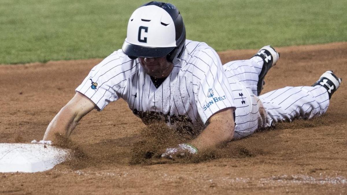 Coastal Carolina’s Peyton Isaacson gets back to first safely during a game earlier this season.