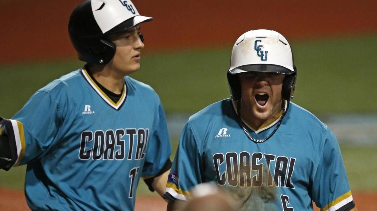 Coastal Carolina's Connor Owings (6) reacts with Billy Cooke after scoring during Sunday’s game against LSU.