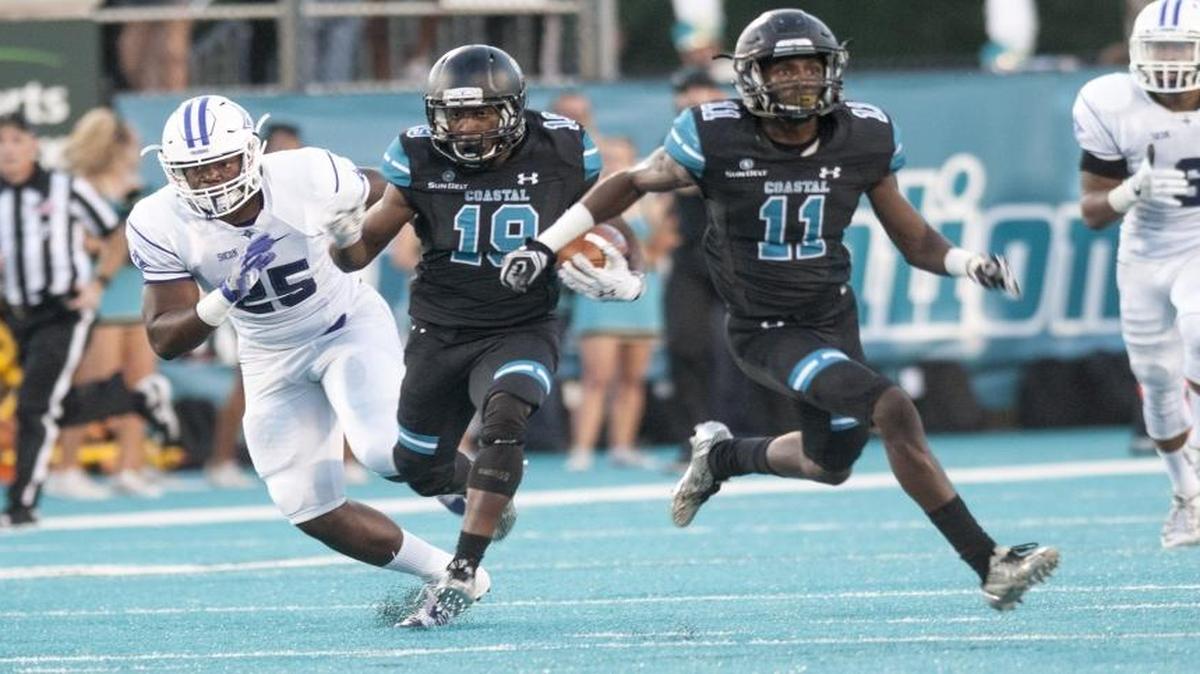 Coastal Carolina’s Ky’Jon Tyler returns his first-ever punt 80 yards for a touchdown on Saturday against Furman.