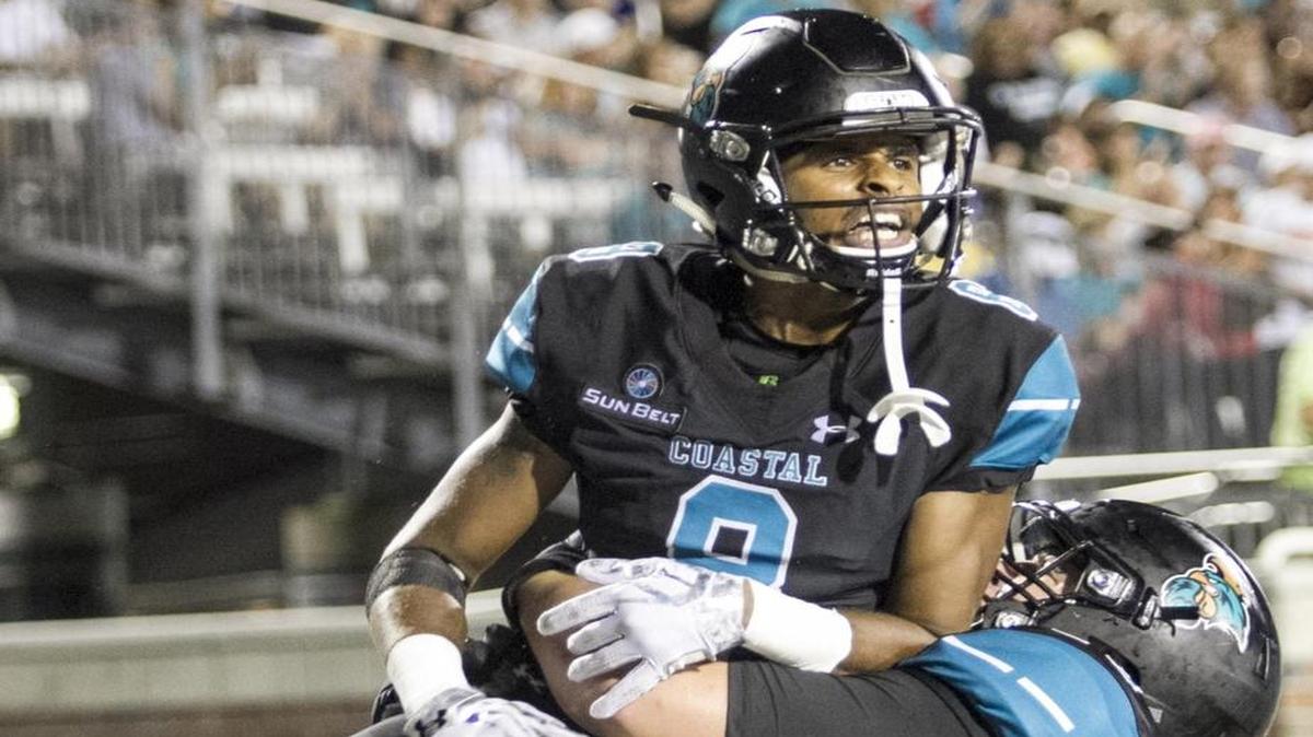 Coastal Carolina’s Chris Jones celebrates a touchdown reception in the third quarter against Furman.