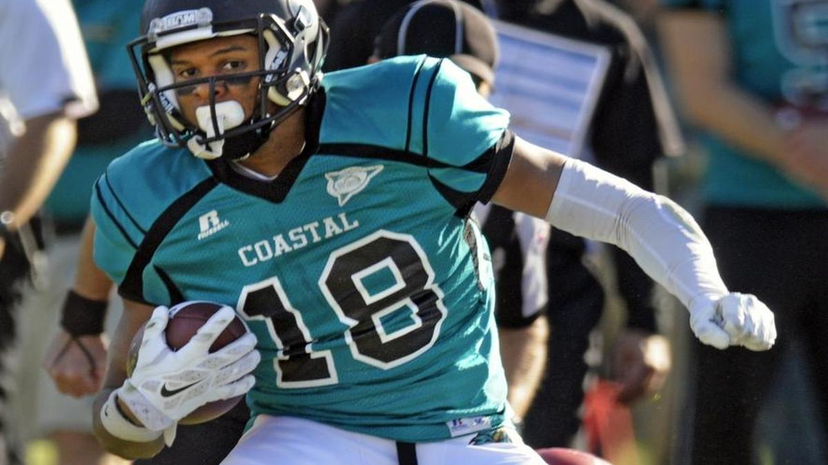 Coastal Carolina wide receiver Bruce Mapp looks for running room during the Chants’ 2014 game against Liberty.