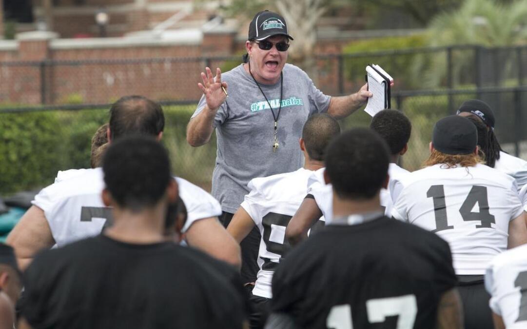 
Coastal Carolina coach Joe Moglia speaks to his team during a recent practice.
