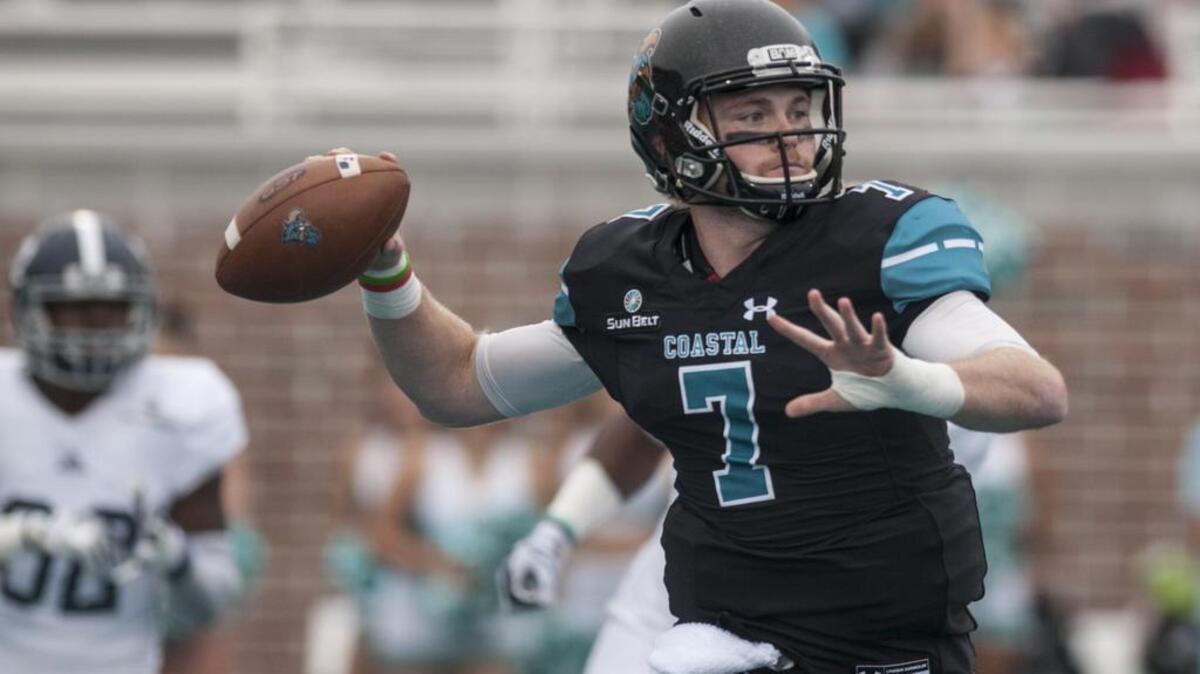 Coastal Carolina’s Kilton Anderson passes under pressure from Georgia Southern in the 2017 season finale at Brooks Stadium on Dec. 2, 2017. Anderson has been deemed a game-time decision for Saturday’s game against Lousiana-Monroe.