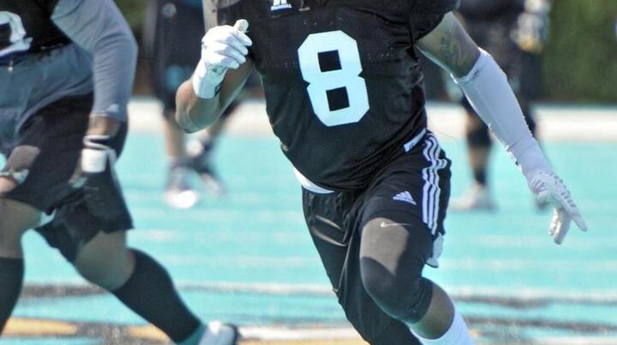 
Coastal Carolina senior linebacker Rayshaud Shields runs a play during practice at Brooks Stadium on Wednesday morning.
