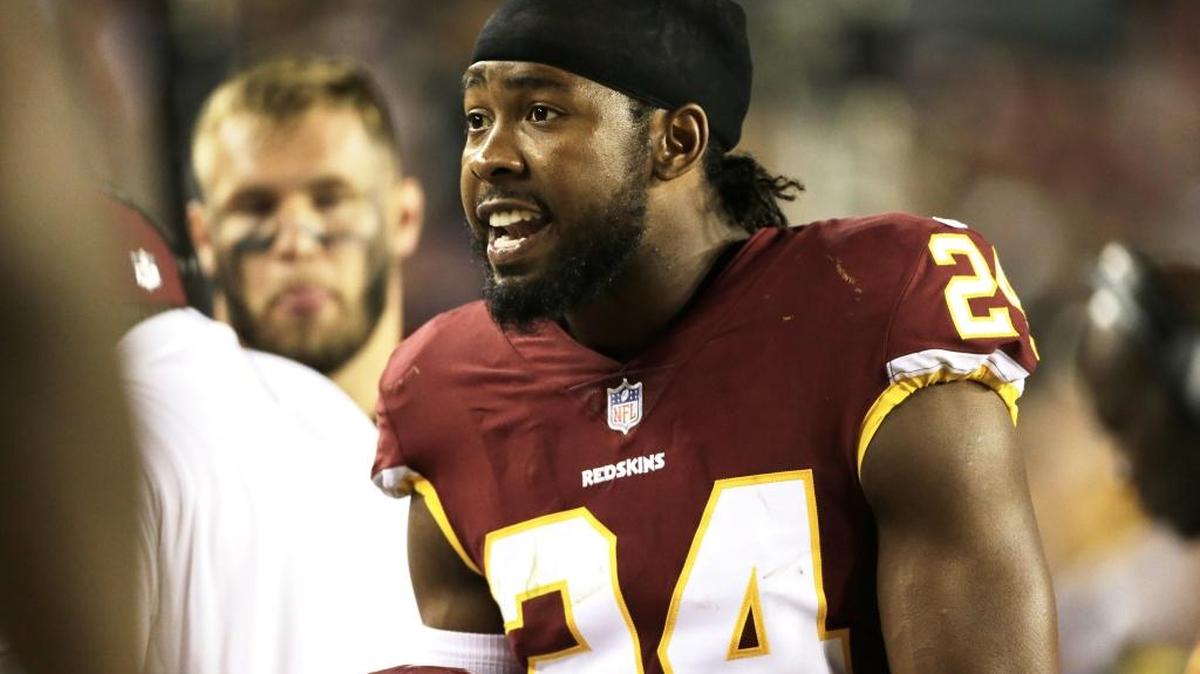 Washington Redskins cornerback Josh Norman talks with teammates on the bench during last week’s game.