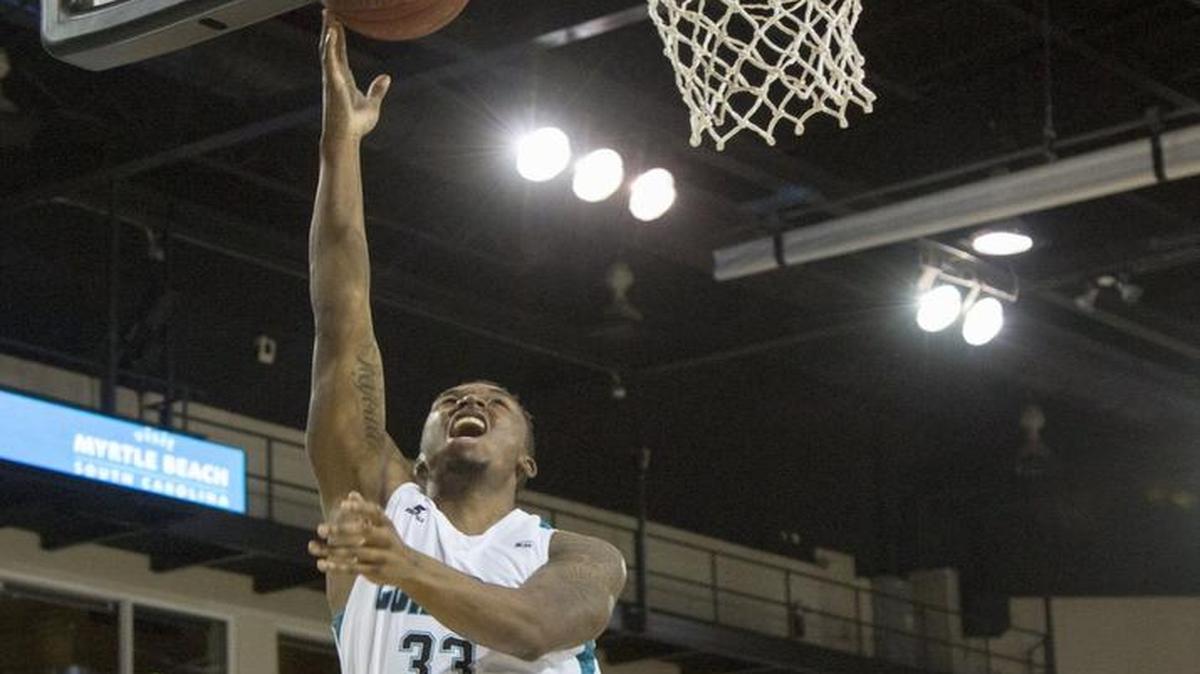 Coastal Carolina’s Ron Trapps puts up a layup against Presbyterian on Thursday night.