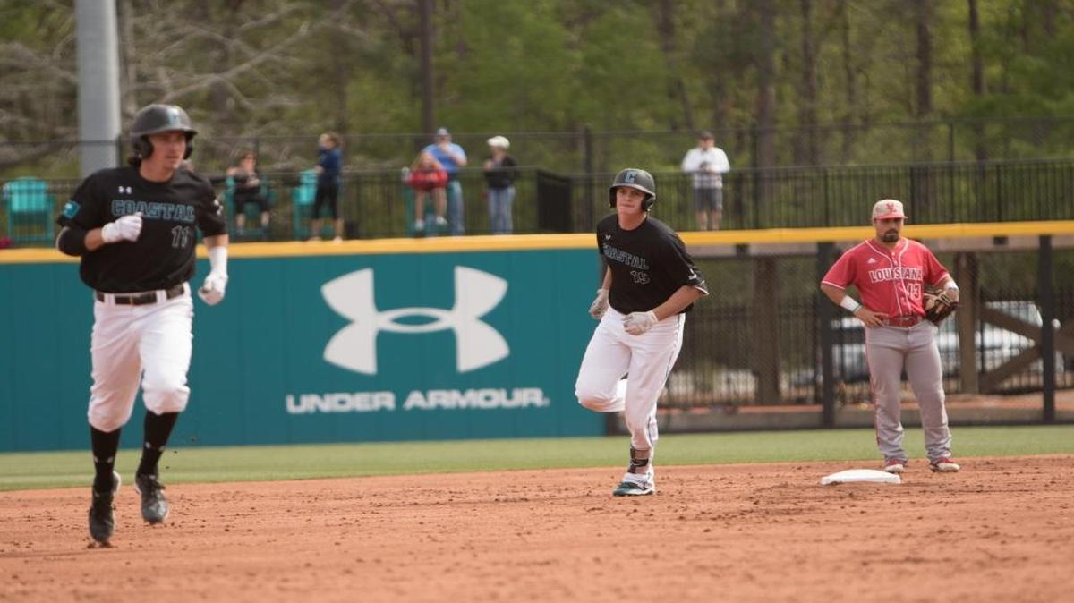 Kevin Woodall Jr. (center) hit a three-run home run against Louisiana on Sunday.