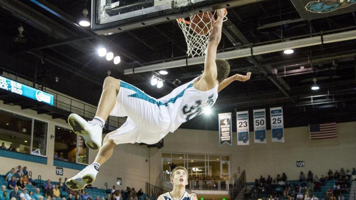 Colton Ray-St Cyr slams one home Thursday night for Coastal Carolina in the team’s home opener at The HTC Center against Grace Bible College.