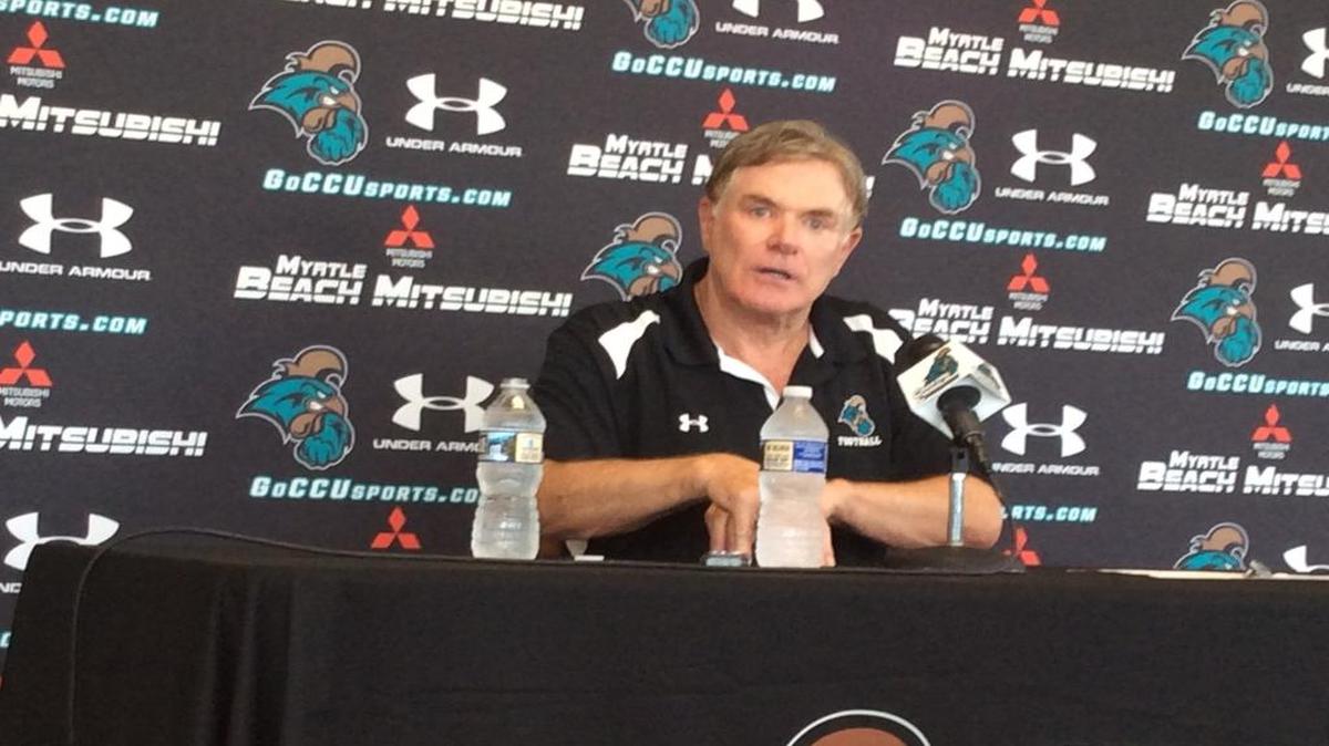 Coastal Carolina head football coach Joe Moglia talks during a press conference announcing his five-month medical sabbatical from his coaching position.